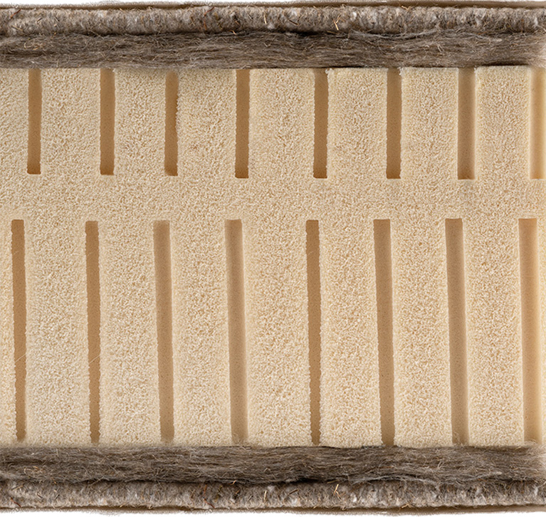 Coupe du matelas latex naturel présentant les différentes matières le composant
