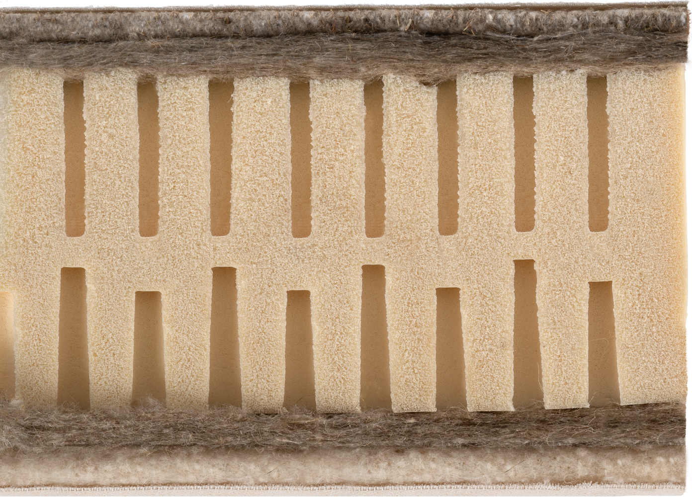 Coupe du matelas enfant bio présentant les différentes matières le composant