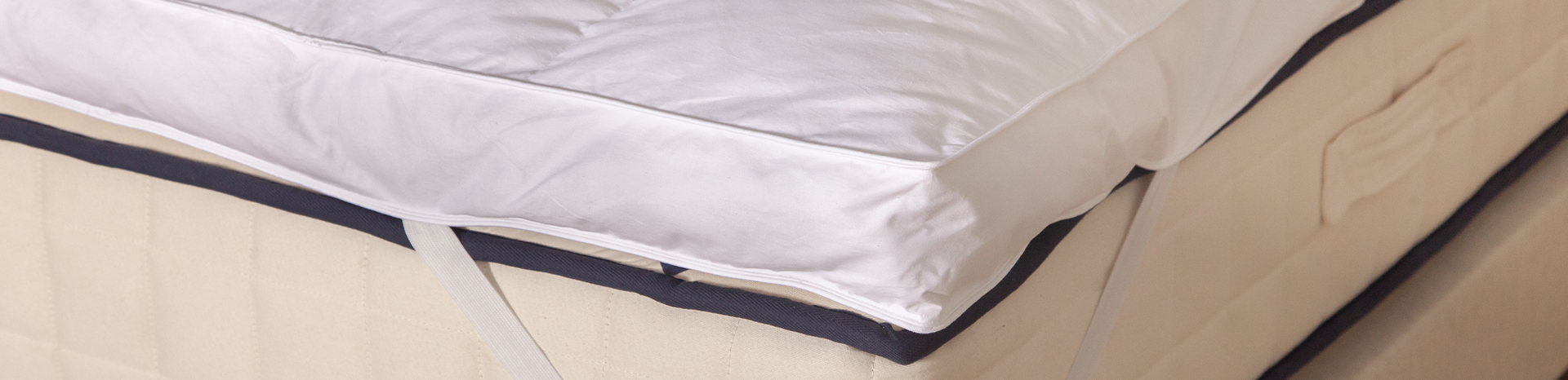 Image d'un surmatelas confort en plume et duvet