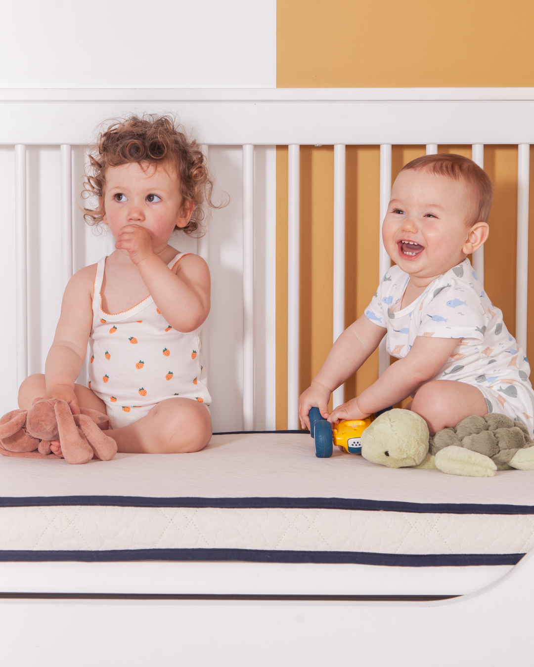 Image représentant un bébé sur un matelas Le Petit Cosme